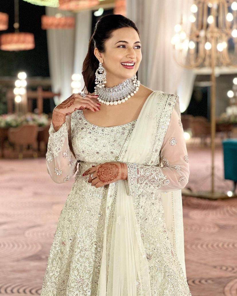 Celebrity Style Off White Color Sharara Suit