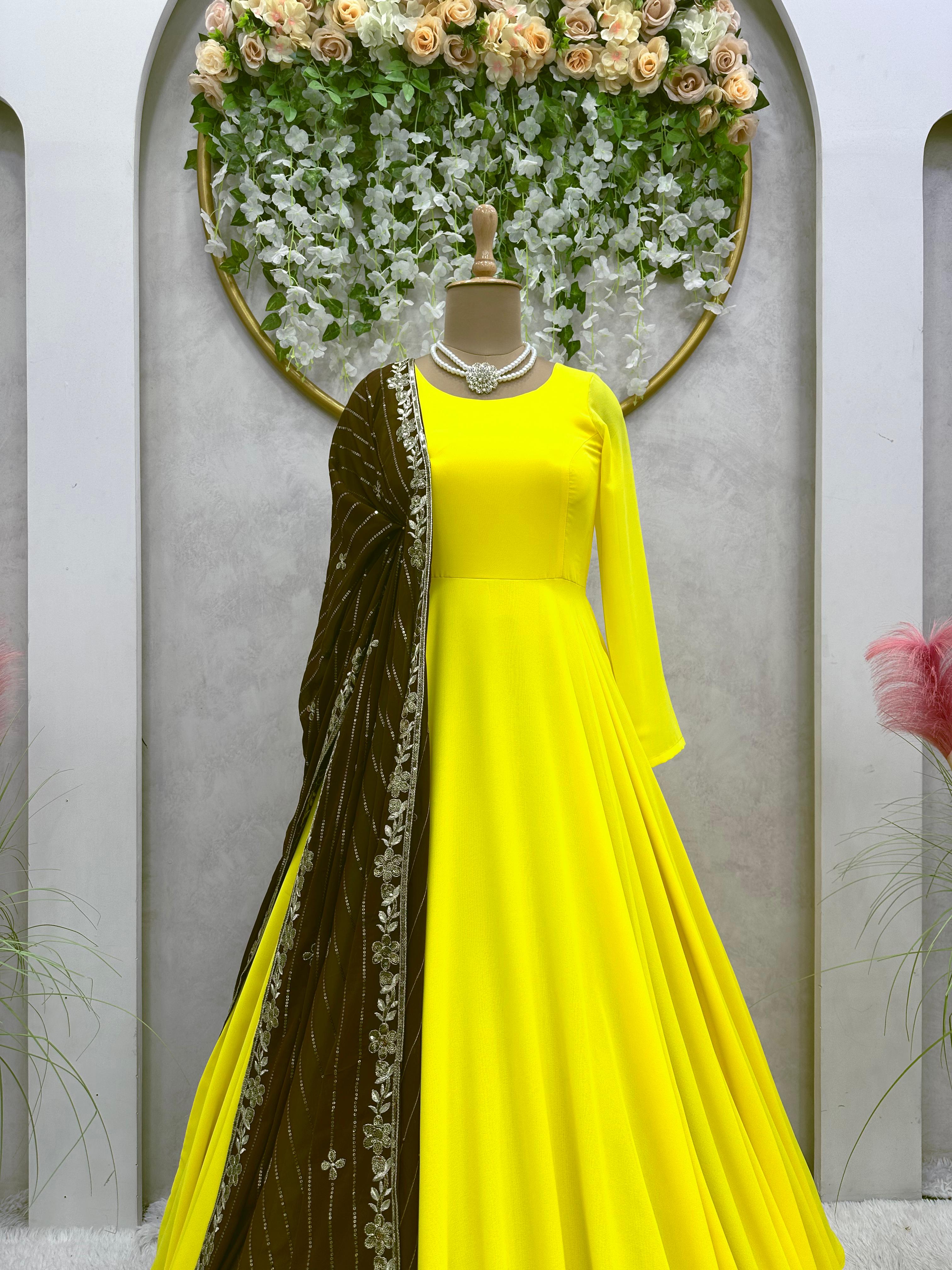 Amazing Backside Dori Pattern Yellow Gown With Brown Dupatta
