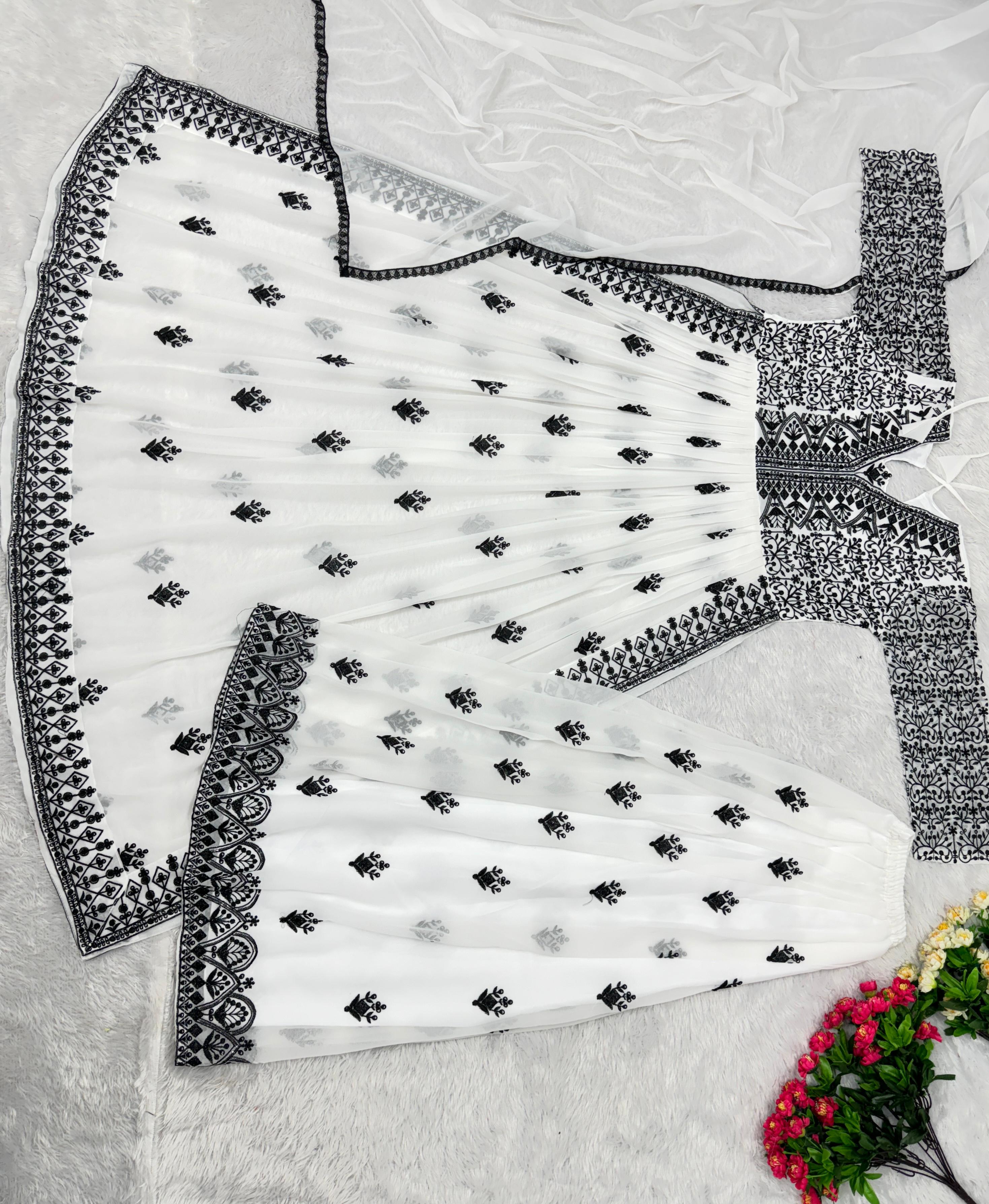 Decent Black And White Color Kurti With Palazzo Suit