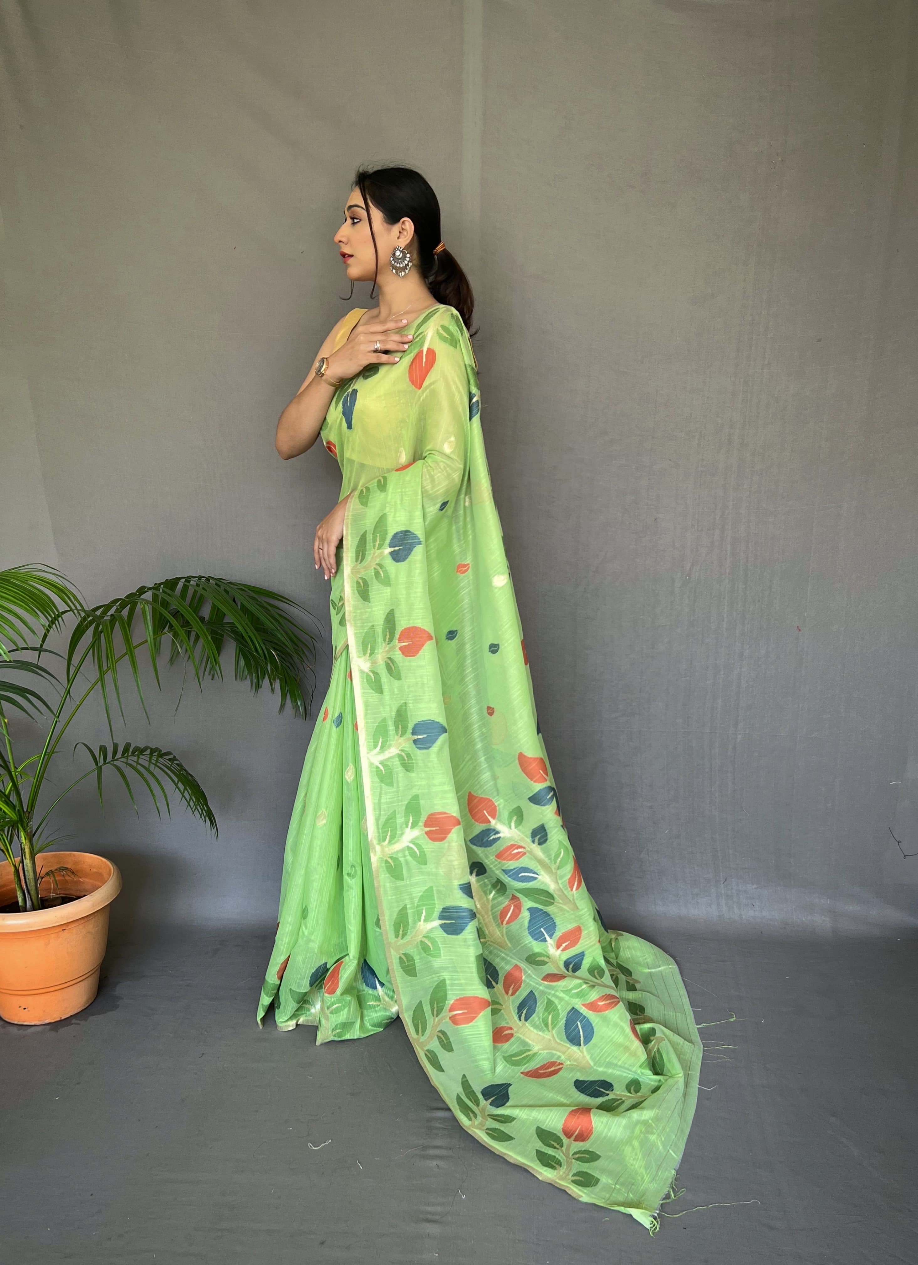 Green Linen Saree With Meenakari Weaving Work