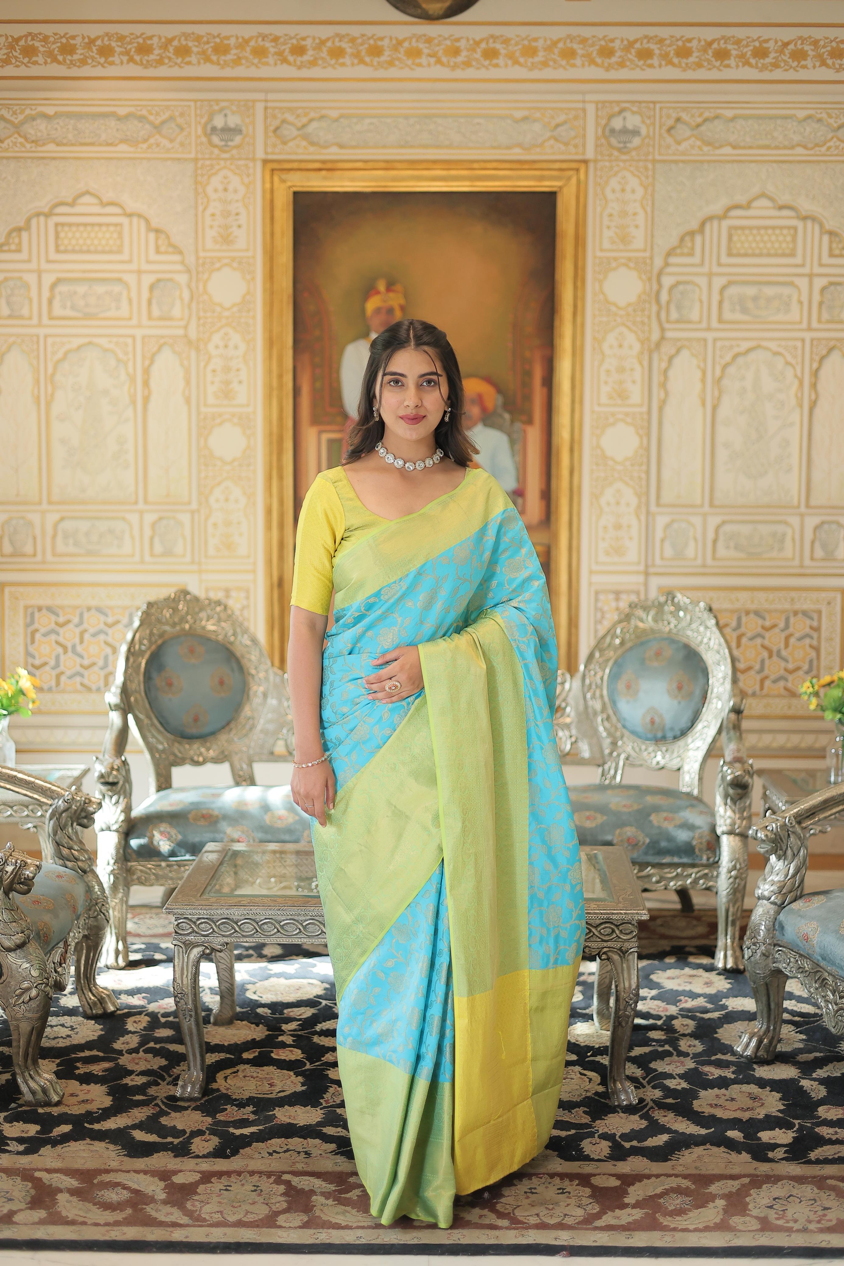 Precious Green Border Sky Blue Zari Weaving Silk Saree