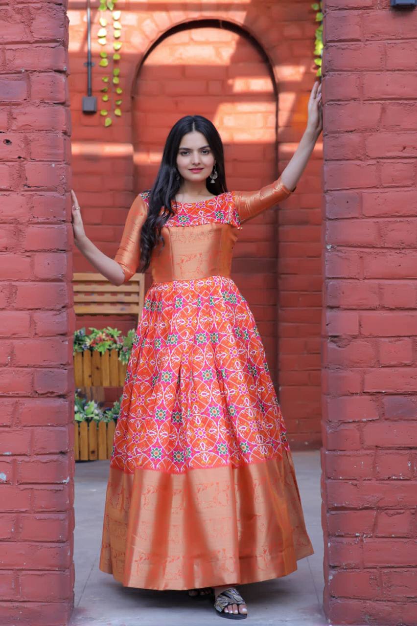 Beautiful Patola Print Orange Color Gown
