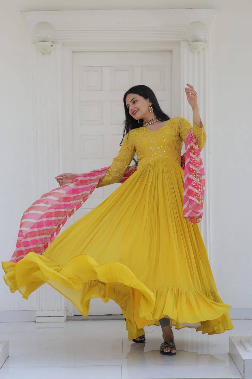 Occasion Wear Yellow Color Embroidered Work Gown