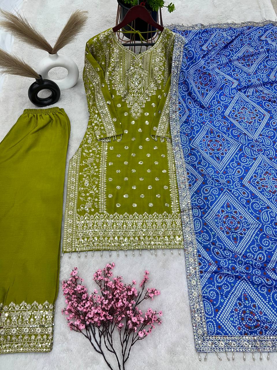 Admiring Parrot Green Salwar Suit With Heavy Work