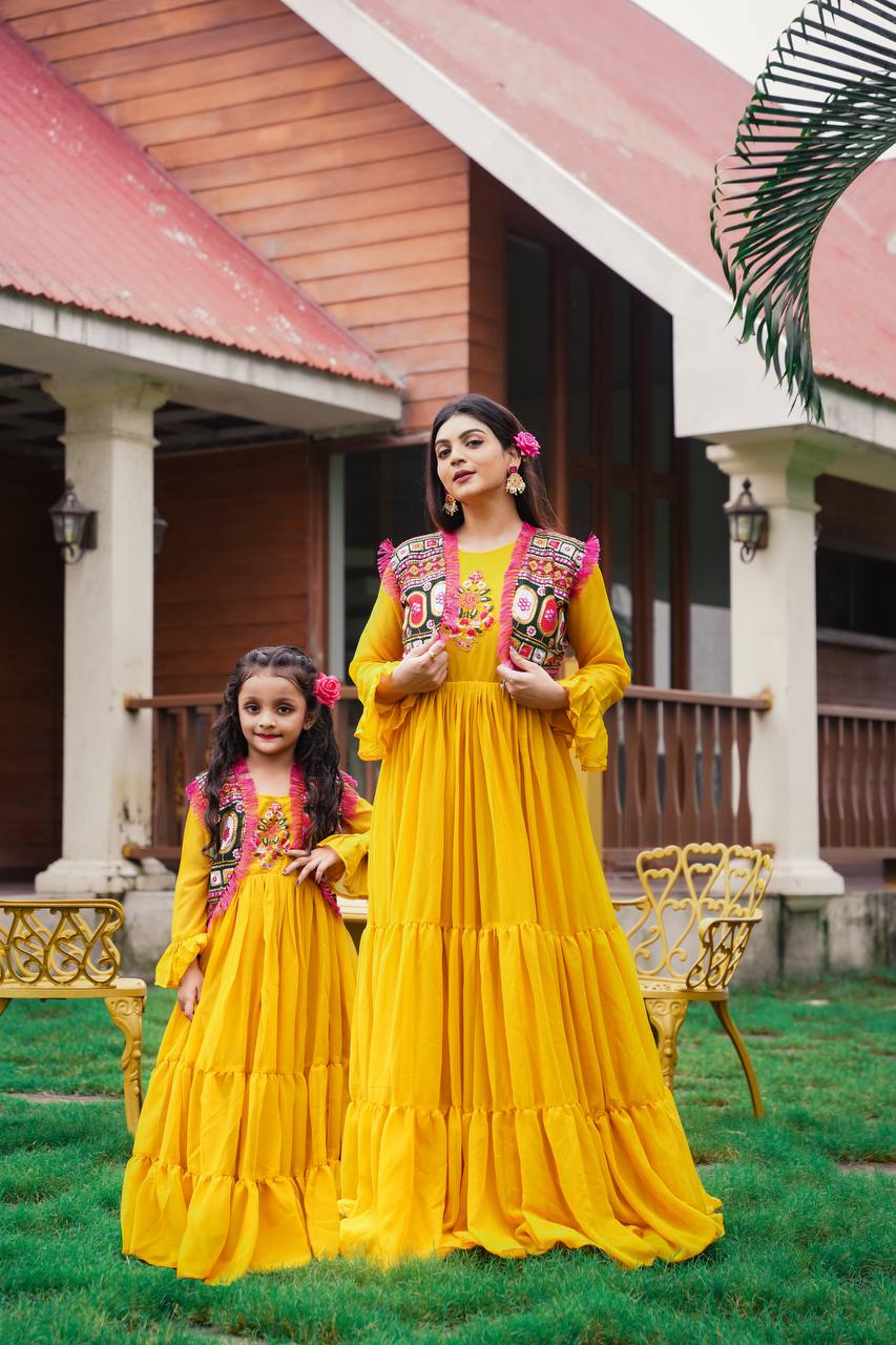 Yellow Color Embroidery Work Mother Daughter Ruffle Gown