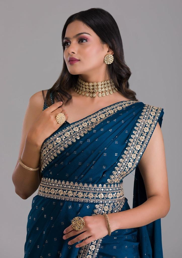 Attractive Foil Print With Zari Work Teal Blue Color Saree