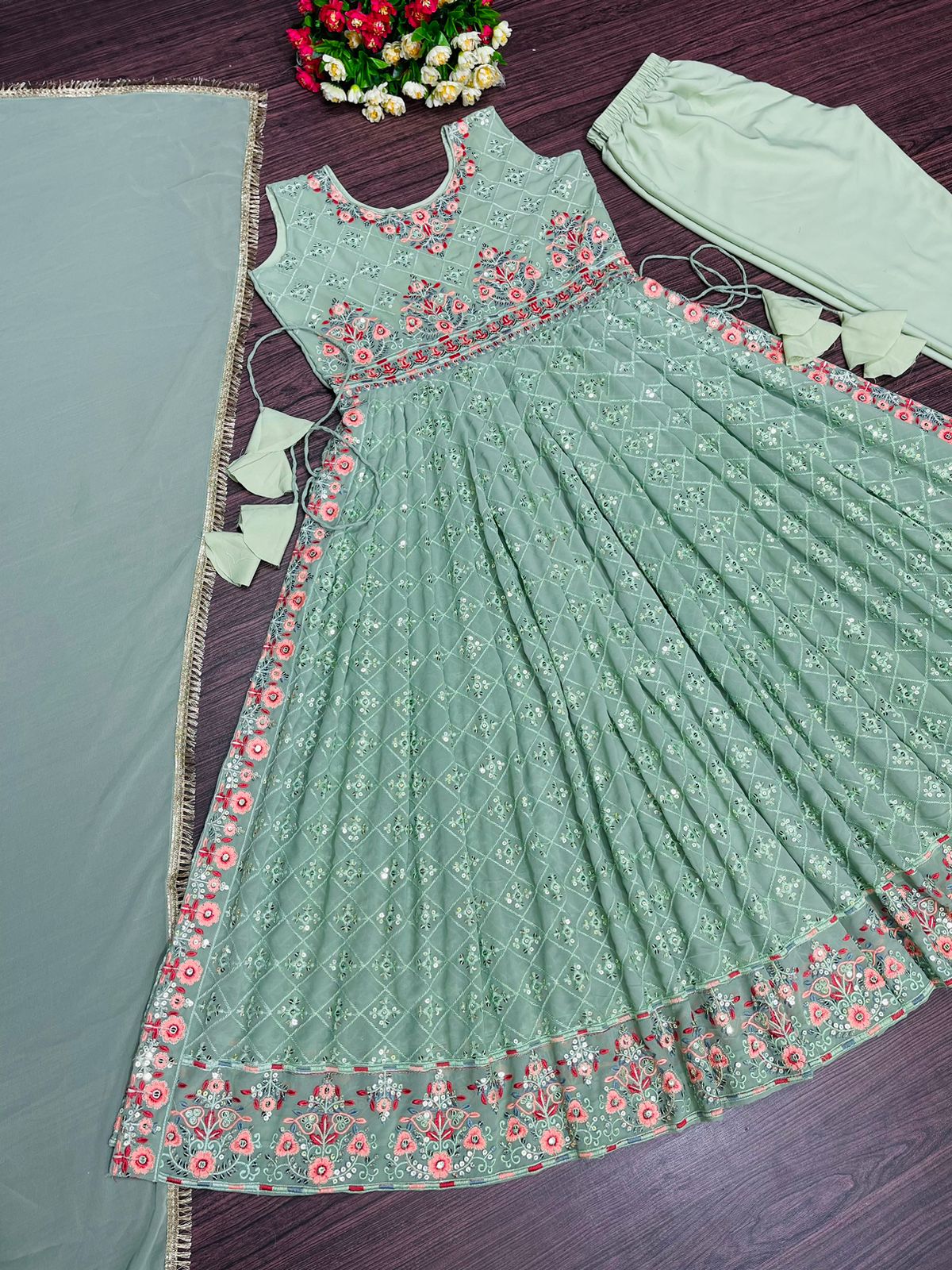 Adorable Pista Green Sequence Work Gown