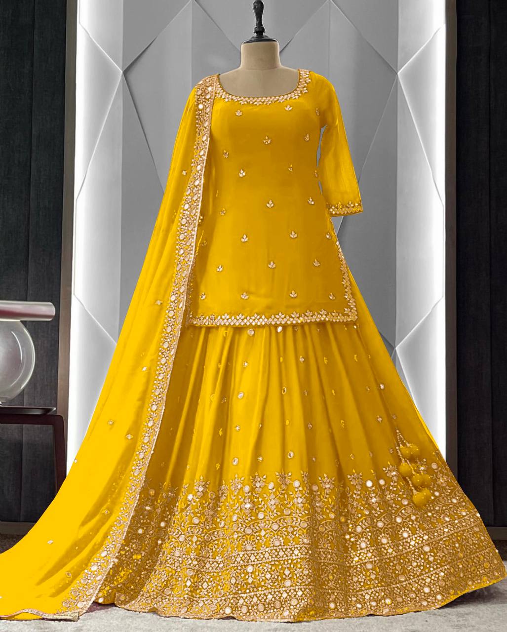 Fashionable Yellow Color Embroidery And Sequence Work Top With Lehenga